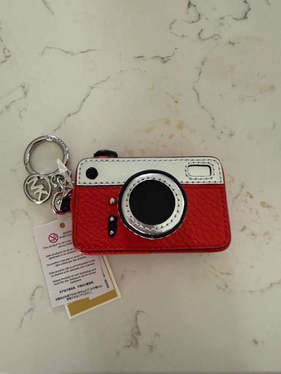 Michael Kors Accessories - Michael Kors Red and White Camera Charm Keychain with Silver Hardware